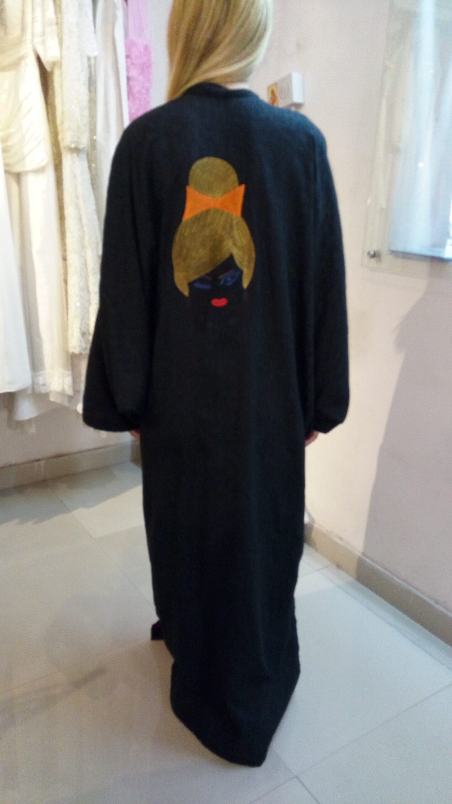 Laila Abaya with Blue Eyes, Golden Hair & Orange Bow Detail - Image 3